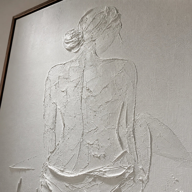 Detail of raised ivory forms in an artwork